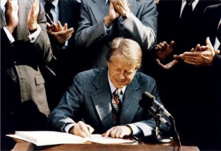 August 4, 1977 – President Carter Signs the The Department of Energy Organization Act Combining Several Agencies Under the New Secretary of Energy.
